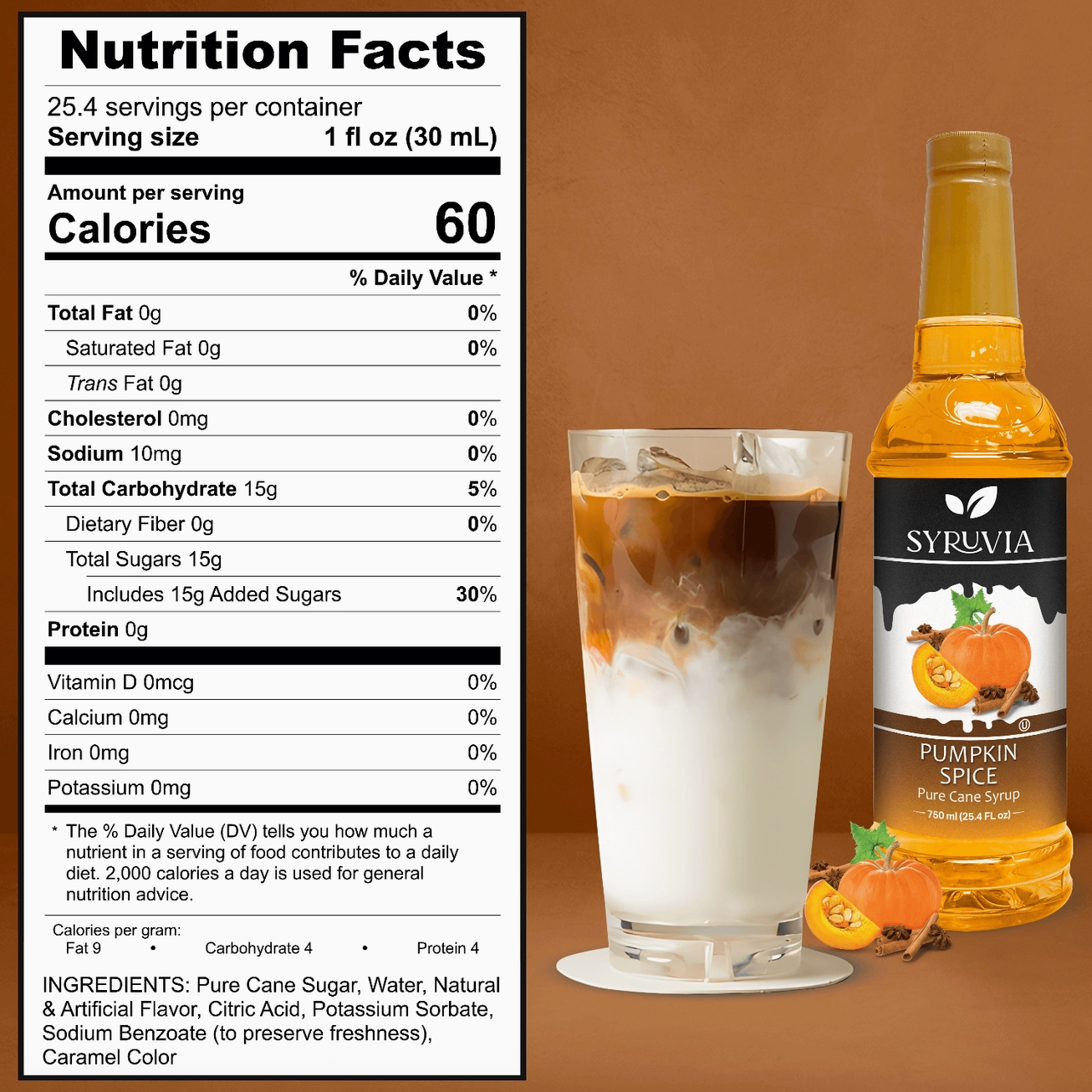 Pumpkin spice syrup bottle with nutrition facts label and a glass of iced pumpkin spice latte on a brown background